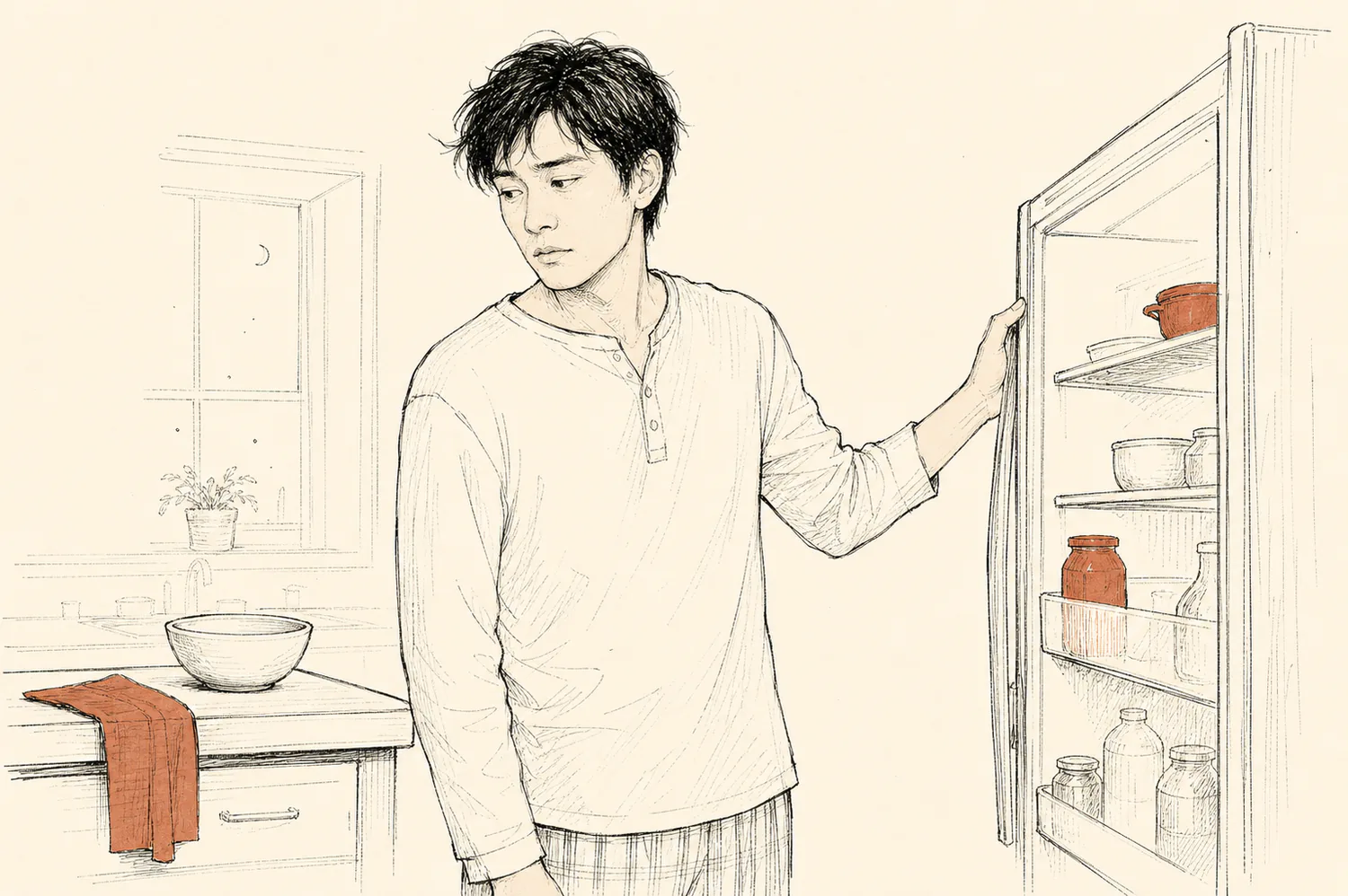 A younger man pauses with one hand on an open refrigerator door in a quiet kitchen at night.
